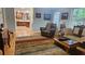 Open-concept living space showcasing hardwood floors and seamless flow into the adjacent kitchen at 2859 Wood Park Nw Trce, Kennesaw, GA 30152