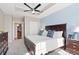 Beautiful bedroom features a tray ceiling, ceiling fan, wood furnishings and lots of sunlight at 325 E Paces Ferry Rd # 2003, Atlanta, GA 30305