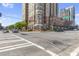 Street view of a modern apartment building on a sunny day at 325 E Paces Ferry Rd # 2003, Atlanta, GA 30305