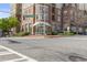 Street view of the building's exterior, showcasing a well-landscaped entrance at 325 E Paces Ferry Rd # 2003, Atlanta, GA 30305