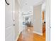 Open-concept living room featuring hardwood floors, neutral walls and modern furnishings at 325 E Paces Ferry Rd # 2003, Atlanta, GA 30305