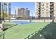 Private tennis court in a community setting offers a convenient and active lifestyle for tennis enthusiasts of all skill levels at 325 E Paces Ferry Rd # 2003, Atlanta, GA 30305