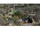 Aerial view of a home at 2324 Leacroft surrounded by mature trees and beautiful landscaping at 5270 Forest Brook Pkwy, Marietta, GA 30068
