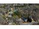 Aerial view of a home at 2324 Leacroft surrounded by mature trees and beautiful landscaping at 5270 Forest Brook Pkwy, Marietta, GA 30068