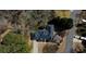 An aerial view shows the layout of the property with surrounding greenery and driveway at 5270 Forest Brook Pkwy, Marietta, GA 30068