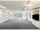 Spacious finished basement with built in bookshelves and natural light at 5270 Forest Brook Pkwy, Marietta, GA 30068