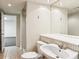 Tiled bathroom with vanity, mirror, toilet, and walk-in shower at 5270 Forest Brook Pkwy, Marietta, GA 30068