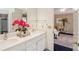 Bright bathroom featuring double sink vanity and a view of the bedroom at 5270 Forest Brook Pkwy, Marietta, GA 30068