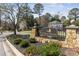 Stone entrance to Forest Brook community with a decorative sign and landscaping at 5270 Forest Brook Pkwy, Marietta, GA 30068