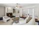 Bright living room with fireplace, neutral furniture, and a cozy seating area at 5270 Forest Brook Pkwy, Marietta, GA 30068