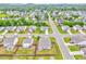 An aerial view of a neighborhood with lush green trees and well-maintained lawns, showing homes with fenced yards at 101 Wins Walk, Cartersville, GA 30121