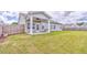 Private backyard with a covered patio and ample green space, creating a serene outdoor oasis at 101 Wins Walk, Cartersville, GA 30121