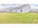 Large backyard featuring a covered patio and expansive lawn, ideal for relaxation and entertaining at 101 Wins Walk, Cartersville, GA 30121
