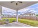 Covered patio in a fenced backyard with lush green grass at 101 Wins Walk, Cartersville, GA 30121