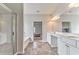 Bathroom featuring a glass-enclosed shower, tub and double vanity at 101 Wins Walk, Cartersville, GA 30121