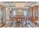 Formal dining room with hardwood floors, coffered ceiling, and antique china cabinets at 101 Wins Walk, Cartersville, GA 30121