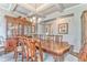 Formal dining room featuring a large, ornate table with seating for eight and elegant decor at 101 Wins Walk, Cartersville, GA 30121