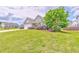 Beautifully landscaped front yard with mature trees and shrubs, adding curb appeal to the property at 101 Wins Walk, Cartersville, GA 30121