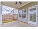 View of back patio with house featuring a white door and window at 101 Wins Walk, Cartersville, GA 30121
