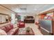 Finished basement featuring a bar, TV, and cozy seating at 1292 Green Turf Dr, Snellville, GA 30078