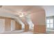 Large, uniquely shaped bedroom with dormer windows and built-in bench seating at 1292 Green Turf Dr, Snellville, GA 30078