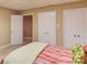 Bedroom featuring convenient closet space and neutral wall colors, providing ample storage at 1292 Green Turf Dr, Snellville, GA 30078