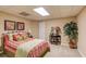 Cozy bedroom with neutral walls, a comfortable bed, and decorative touches for a relaxing atmosphere at 1292 Green Turf Dr, Snellville, GA 30078