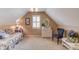 Cozy bedroom featuring neutral carpet, natural light, and cottagecore decor at 1292 Green Turf Dr, Snellville, GA 30078