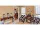Sitting room with eclectic decor, a patterned armchair, and wooden desk at 1292 Green Turf Dr, Snellville, GA 30078