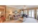 Comfortable living room with a neutral color palette, plush seating, and lots of natural light and modern decor at 1292 Green Turf Dr, Snellville, GA 30078