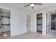 Bedroom featuring hardwood floors, two walk-in closets, and a bathroom access at 1962 8Th St, Chamblee, GA 30341