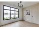 Office space featuring a large window and a modern chandelier at 1962 8Th St, Chamblee, GA 30341