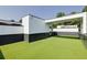 A spacious roof deck with green artificial turf, offering an ideal outdoor space for entertaining and relaxation at 1962 8Th St, Chamblee, GA 30341