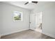 Bright bedroom featuring hardwood-look floors, neutral walls and access to a bathroom via a doorway at 2139 Cedarbrook Court South East, Atlanta, GA 30316