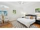 Bright bedroom with a ceiling fan, large windows, and a comfortable bed at 2139 Cedarbrook Court South East, Atlanta, GA 30316