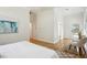 Bright bedroom featuring hardwood floors, white walls, and stylish decor at 2139 Cedarbrook Court South East, Atlanta, GA 30316