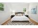 Bright bedroom with a ceiling fan, large windows, and a comfortable bed at 2139 Cedarbrook Court South East, Atlanta, GA 30316