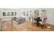 Comfortable living and dining areas featuring hardwood floors and lots of natural light at 2139 Cedarbrook Court South East, Atlanta, GA 30316