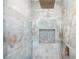 Stunning shower with rainfall showerhead and mosaic tile niche at 2139 Cedarbrook Court South East, Atlanta, GA 30316