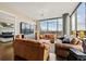Inviting living room boasts natural light, hardwood floors and city views at 270 17Th Nw St # 1113, Atlanta, GA 30363