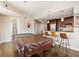 Open concept living space featuring a modern kitchen, pool table, and inviting atmosphere at 270 17Th Nw St # 1113, Atlanta, GA 30363