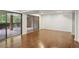 Spacious basement featuring wood floors and access to the outdoor patio via sliding glass doors at 49 Willow Gln, Atlanta, GA 30342