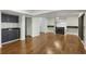 Finished basement featuring sleek hardwood floors, a fireplace, and a convenient wet bar area at 49 Willow Gln, Atlanta, GA 30342