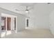 Spacious bedroom featuring ample natural light, a ceiling fan and neutral carpet at 49 Willow Gln, Atlanta, GA 30342