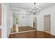 Elegant dining room with a mirrored wall and chandelier at 49 Willow Gln, Atlanta, GA 30342