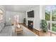 Inviting living room with fireplace, hardwood floors and large windows, perfect for relaxation at 49 Willow Gln, Atlanta, GA 30342