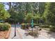 Outdoor pool area with dining and lounge spaces, ideal for social gatherings and relaxation at 49 Willow Gln, Atlanta, GA 30342