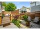 Charming backyard with a stone pathway, wooden fence, and comfortable outdoor seating at 174 Crumley St, Atlanta, GA 30312