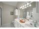 Bathroom with double sinks, shower and a large mirror with lighting at 174 Crumley St, Atlanta, GA 30312