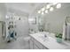 Bright bathroom with a tub/shower, mirror and toilet at 174 Crumley St, Atlanta, GA 30312